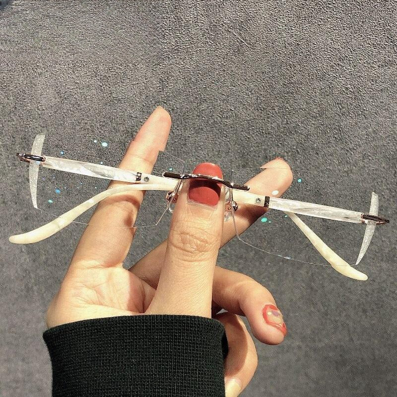 Women's Rectangular Rimless Titanium Prescription Glasses 52025 — view 10 | Rx Spectacle