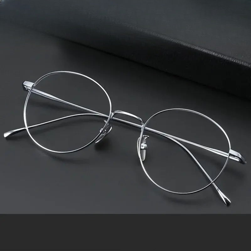 Women's Round Full Rim Titanium Prescription Glasses 71644 — view 1 | Rx Spectacle