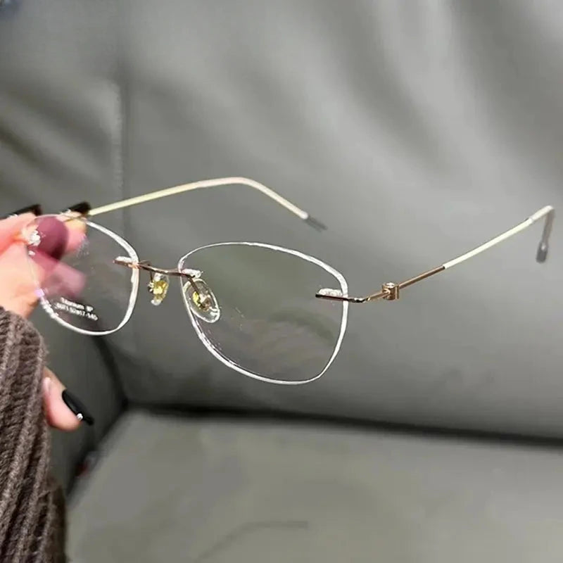 Women's Oval Rimless Titanium Prescription Glasses 696071 — view 2 | Rx Spectacle