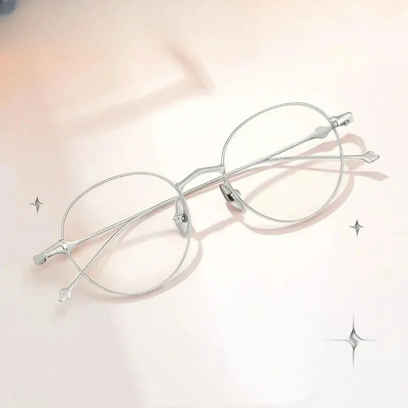 Women's Round Full Rim Titanium Prescription Glasses 369138 — view 1 | Rx Spectacle