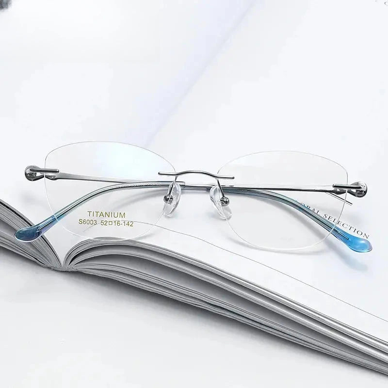 Women's Cat Eye Rimless Titanium Prescription Glasses 196003 — view 1 | Rx Spectacle