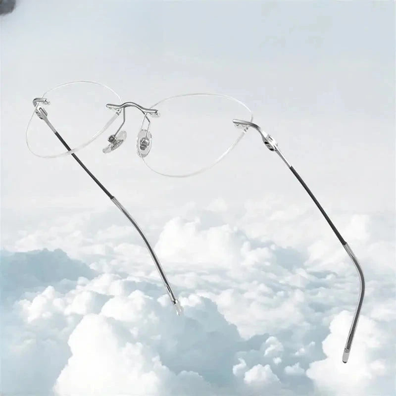 Women's Cat Eye Rimless Titanium Prescription Glasses 406076 — view 1 | Rx Spectacle
