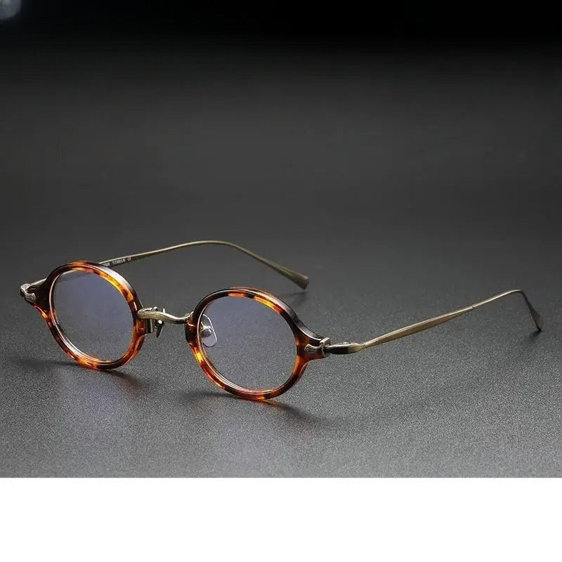Women's Round Full Rim Titanium Prescription Glasses 722181 — view 1 | Rx Spectacle
