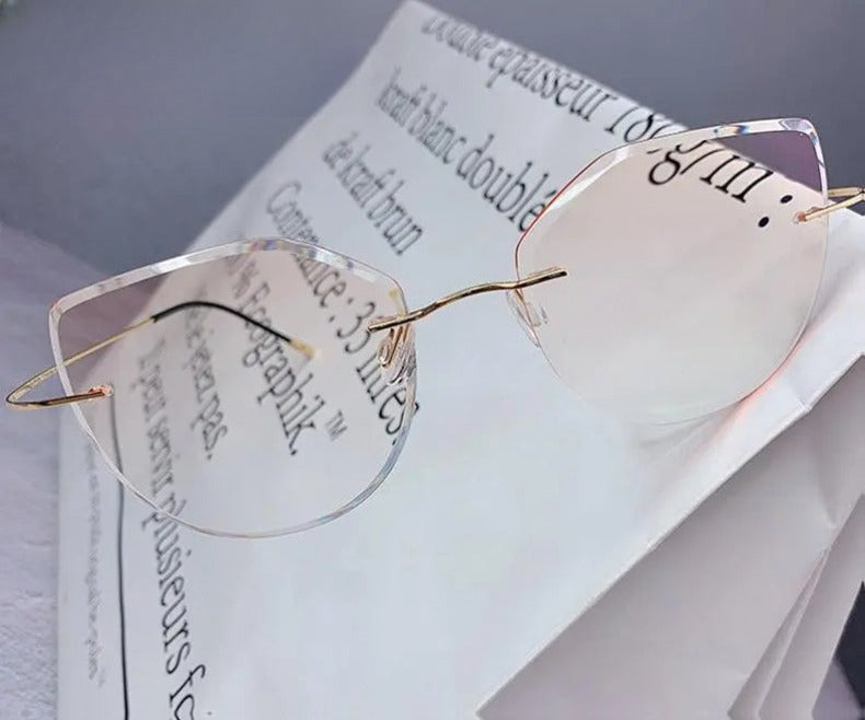 Women's Cat Eye Rimless Titanium Prescription Glasses 16016a — view 12 | Rx Spectacle