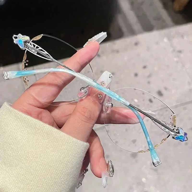Women's Butterfly Rimless Titanium Prescription Glasses 580513 — view 4 | Rx Spectacle