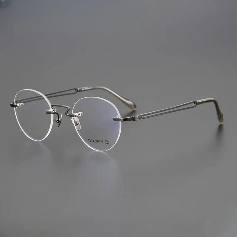 Women's Round Rimless Titanium Prescription Glasses 619063 — view 1 | Rx Spectacle