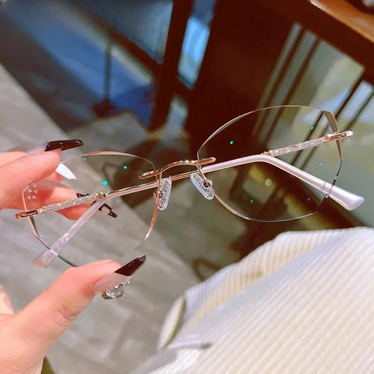 Women's Oval Rimless Titanium Prescription Glasses 88606 — view 1 | Rx Spectacle