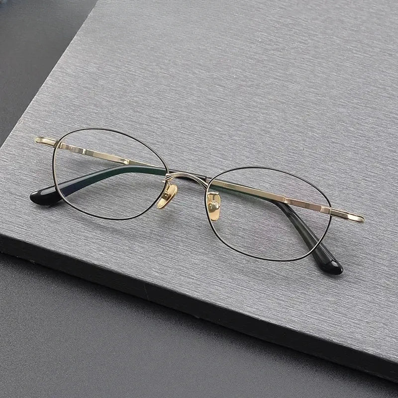 Unisex Oval Full Rim Titanium Prescription Glasses 77049 — view 1 | Rx Spectacle