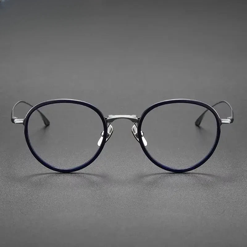 Women's Round Full Rim Titanium Prescription Glasses 361359 — view 1 | Rx Spectacle