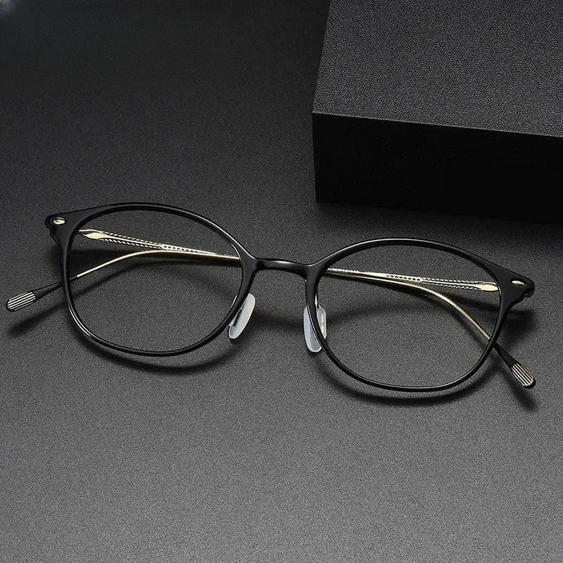 Women's Oval Full Rim Titanium Prescription Glasses 36854 — view 1 | Rx Spectacle