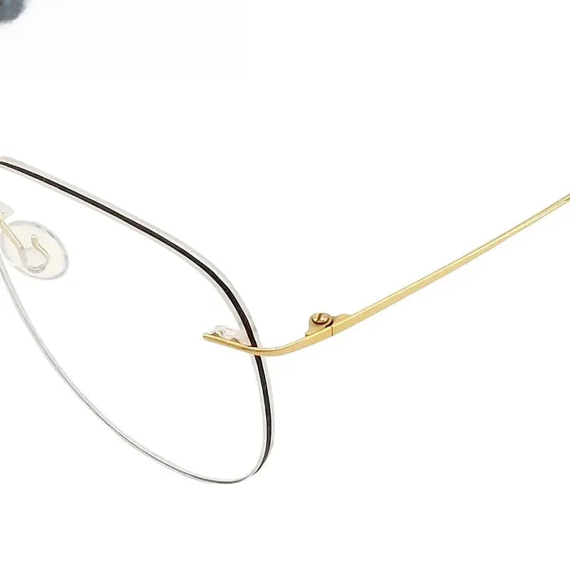 Unisex Oval Rimless Titanium Prescription Glasses Kr05 — view 4 | Rx Spectacle