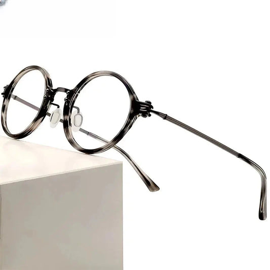 Unisex Round Full Rim Titanium Prescription Glasses 45866 — view 1 | Rx Spectacle