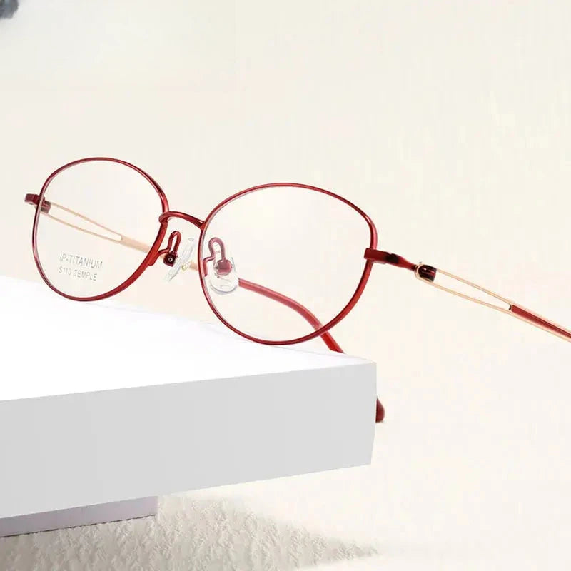 Women's Oval Full Rim Titanium Screwless Prescription Glasses 46110 — view 2 | Rx Spectacle