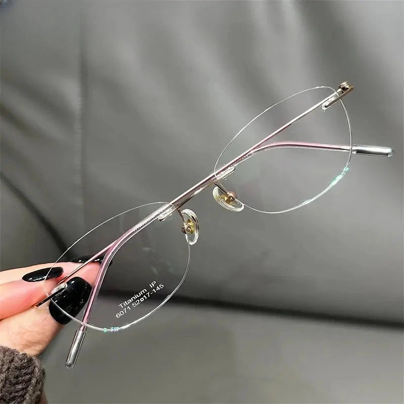 Women's Cat Eye Rimless Titanium Prescription Glasses 666071 — view 3 | Rx Spectacle