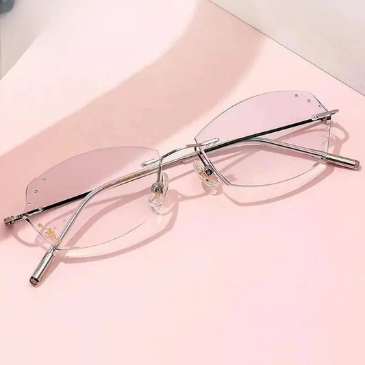Women's Oval Rimless Titanium Prescription Glasses 89834 — view 1 | Rx Spectacle