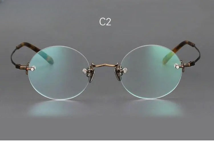 Unisex Round Rimless Titanium Reading Glasses — view 2 | Rx Spectacle