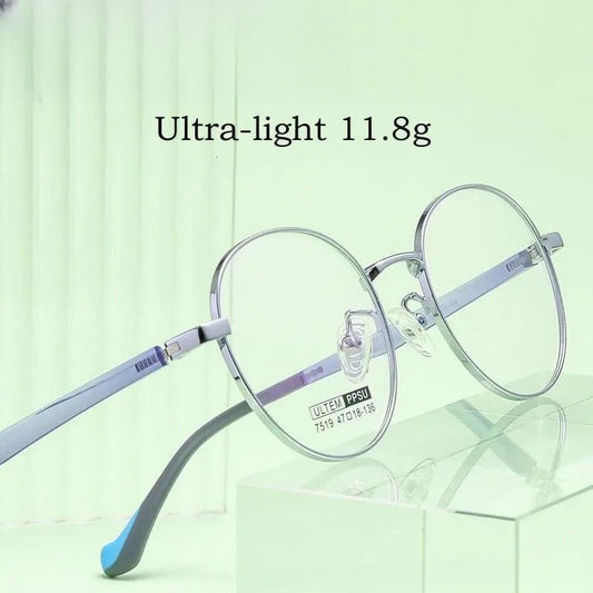 Unisex Round Full Rim Titanium Prescription Glasses 7519S — view 1 | Rx Spectacle