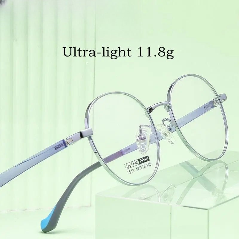 Unisex Round Full Rim Titanium Prescription Glasses 7519s — view 1 | Rx Spectacle