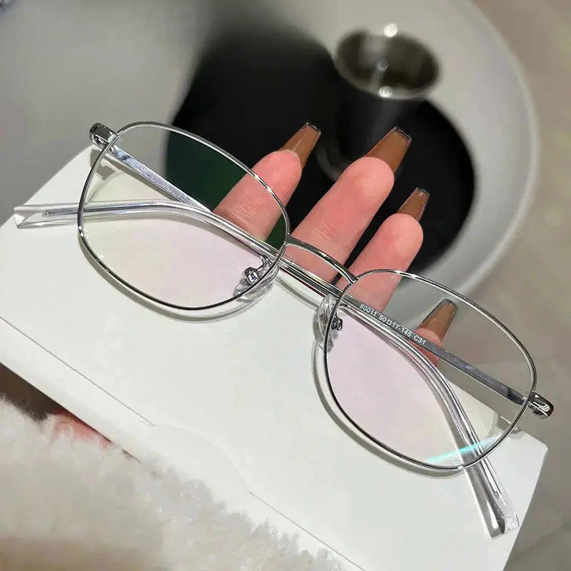 Women's Oval Full Rim Titanium Prescription Glasses 80011 — view 1 | Rx Spectacle