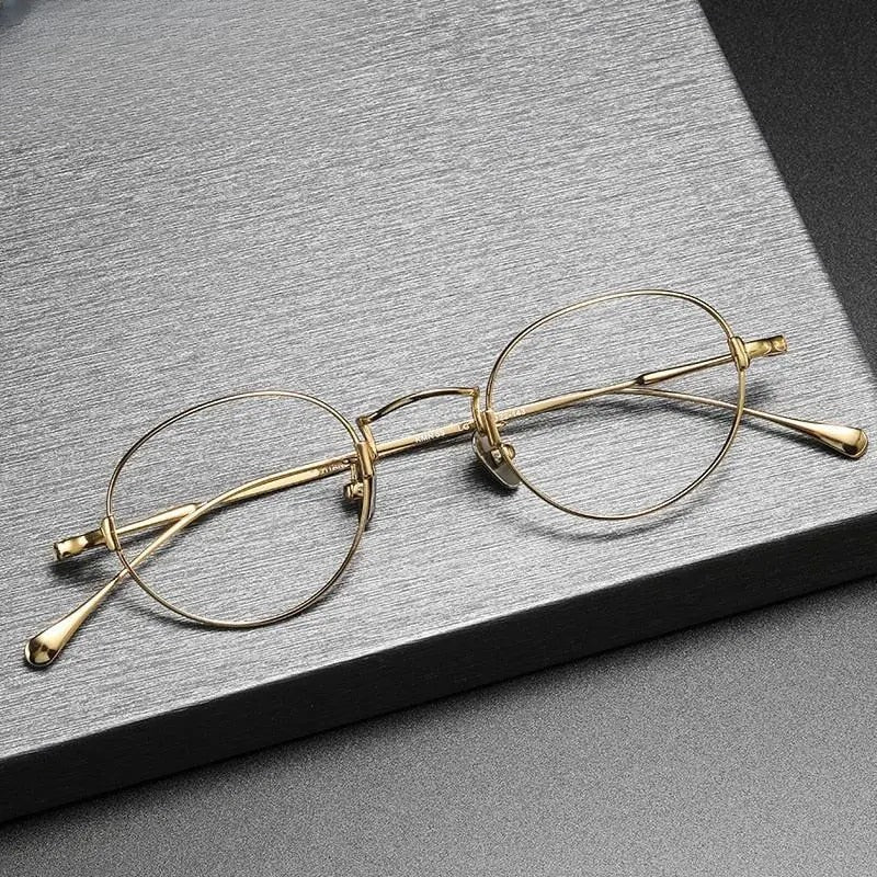 Unisex Round Full Rim Titanium Prescription Glasses Kmn53 — view 1 | Rx Spectacle