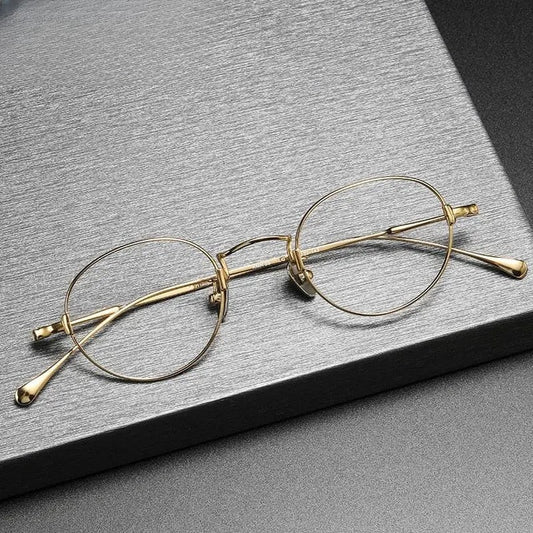 Unisex Round Full Rim Titanium Prescription Glasses Kmn53 — view 1 | Rx Spectacle