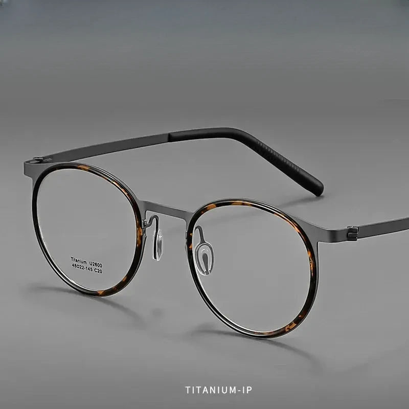 Unisex Round Full Rim Titanium Prescription Glasses J2600 — view 1 | Rx Spectacle