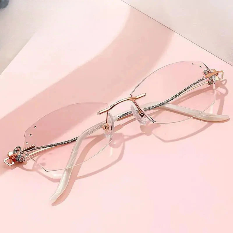 Women's Oval Rimless Titanium Prescription Glasses 54050 — view 1 | Rx Spectacle