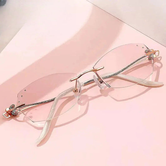 Women's Oval Rimless Titanium Prescription Glasses 54050 — view 1 | Rx Spectacle