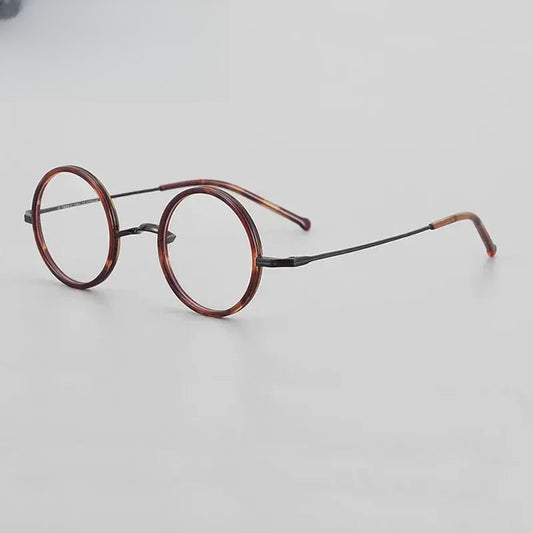 Women's Round Full Rim Titanium Prescription Glasses 535136 — view 1 | Rx Spectacle
