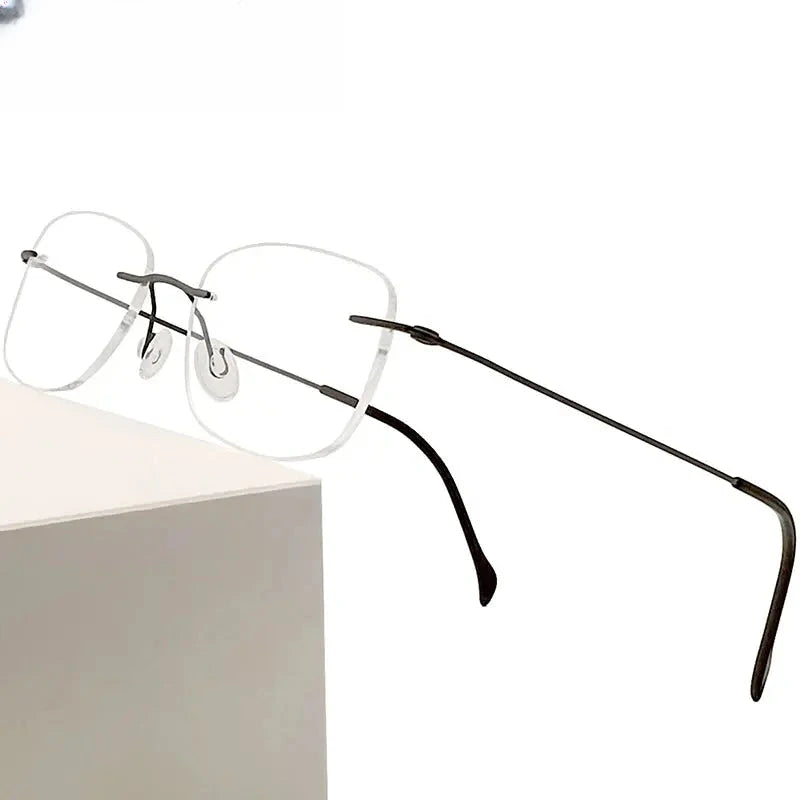 Unisex Oval Rimless Titanium Prescription Glasses 316009 — view 1 | Rx Spectacle