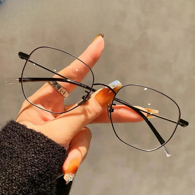 Women's Oval Full Rim Titanium Prescription Glasses 425901 — view 1 | Rx Spectacle