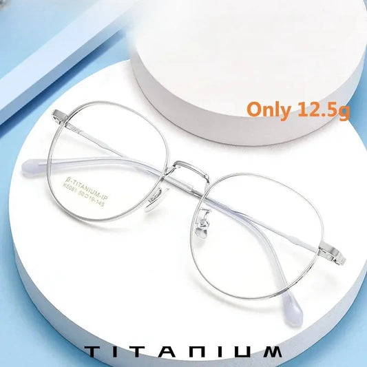 Women's Round Full Rim Titanium Prescription Glasses 50814 — view 1 | Rx Spectacle
