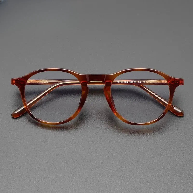Unisex Round Full Rim Titanium Prescription Glasses 759190 — view 1 | Rx Spectacle