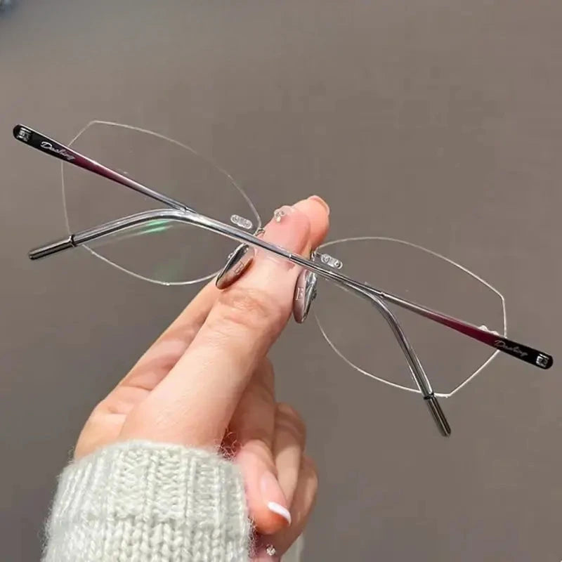 Women's Cat Eye Rimless Titanium Prescription Glasses 60254 — view 6 | Rx Spectacle