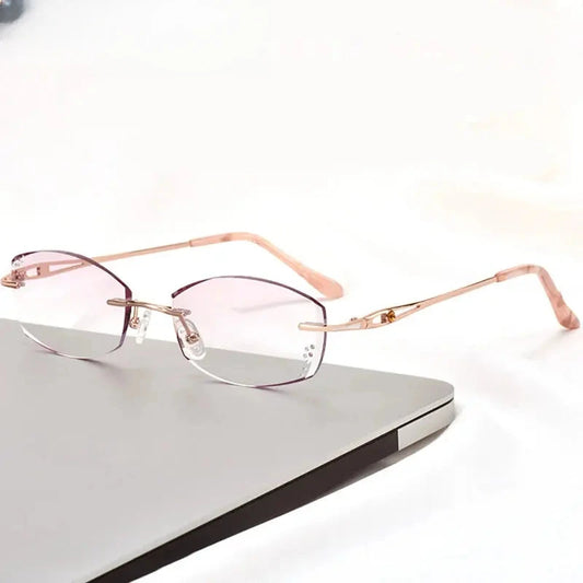 Women's Oval Rimless Titanium Prescription Glasses 99101 — view 1 | Rx Spectacle