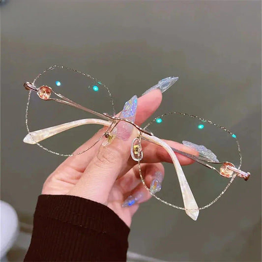 Women's Oval Rimless Titanium Prescription Glasses 3017 — view 1 | Rx Spectacle