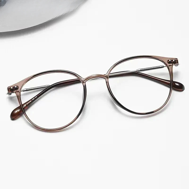 Women's Round Full Rim Titanium Prescription Glasses 390045 — view 1 | Rx Spectacle