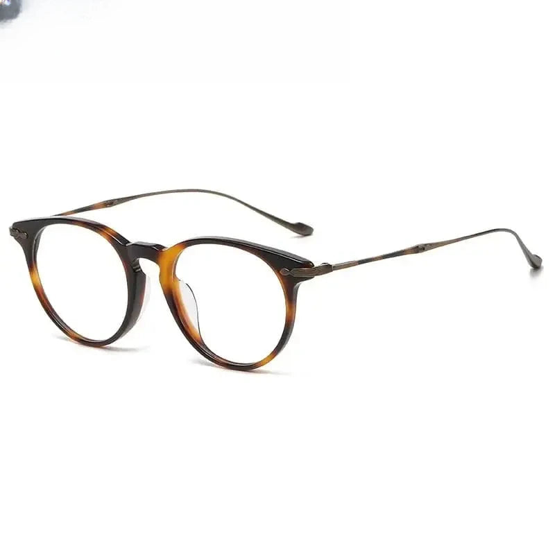 Unisex Round Full Rim Titanium Prescription Glasses 615589 — view 1 | Rx Spectacle
