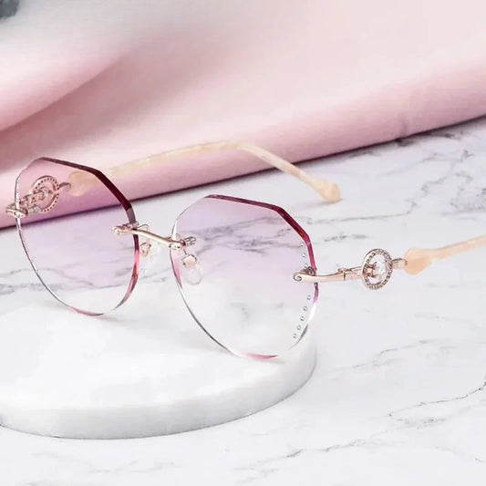 Women's Oval Rimless Titanium Flat Top Prescription Glasses 693097 — view 1 | Rx Spectacle