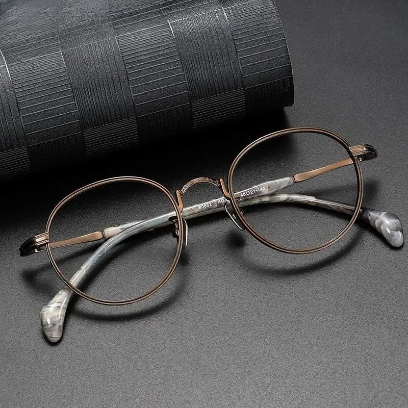 Unisex Round Full Rim Titanium Prescription Glasses 80862 — view 1 | Rx Spectacle