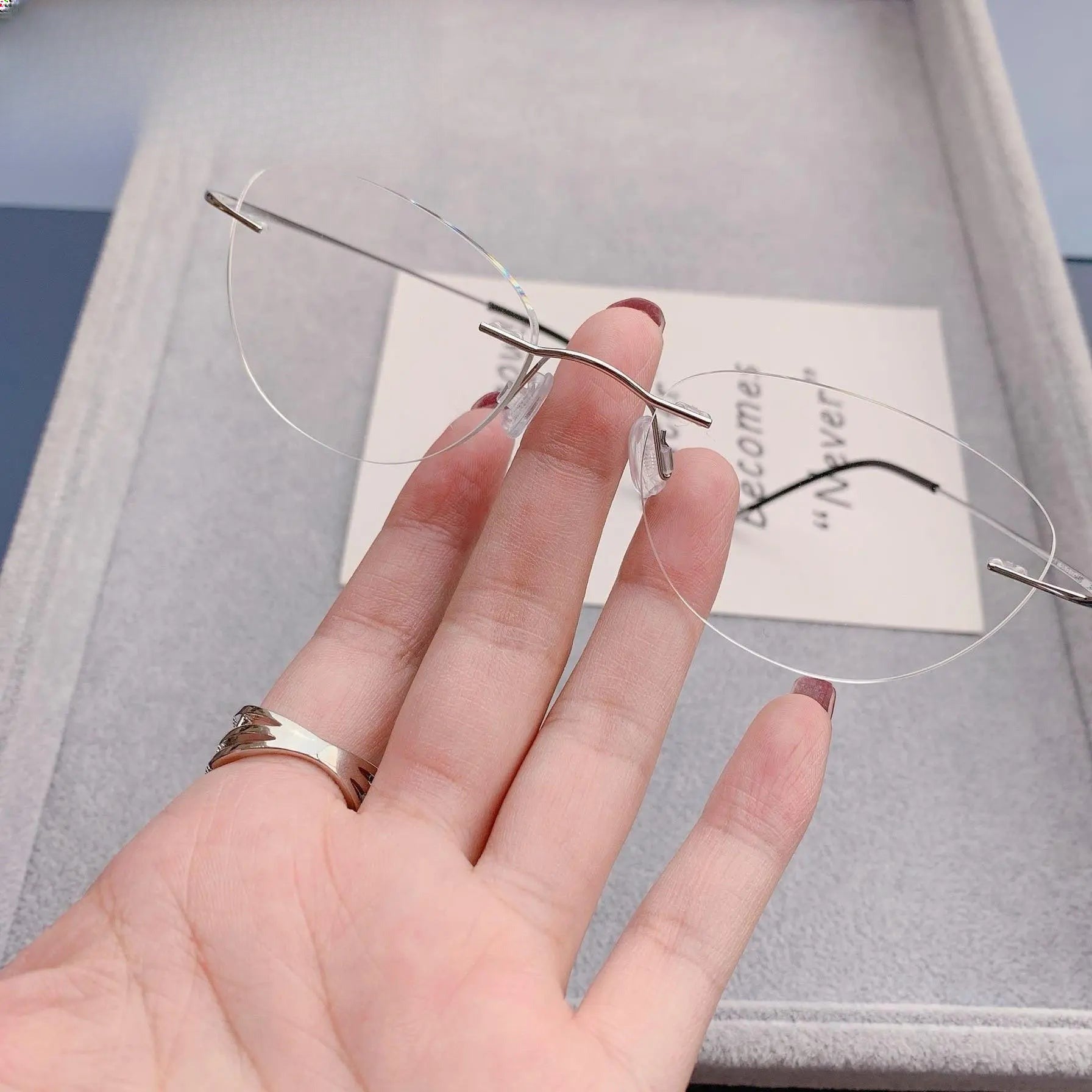 Unisex Cat Eye Rimless Titanium Prescription Glasses 6074-2 — view 2 | Rx Spectacle