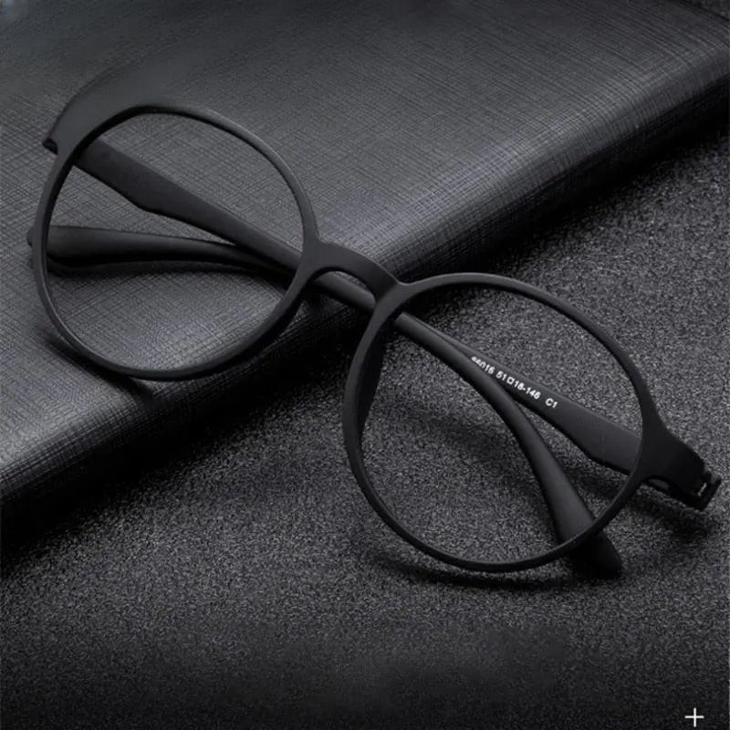 Unisex Round Full Rim Titanium Reading Glasses 66016 — view 1 | Rx Spectacle
