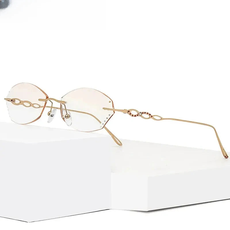 Women's Oval Rimless Titanium Prescription Glasses 32856 — view 1 | Rx Spectacle