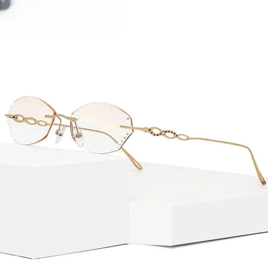 Women's Oval Rimless Titanium Prescription Glasses 32856 — view 1 | Rx Spectacle