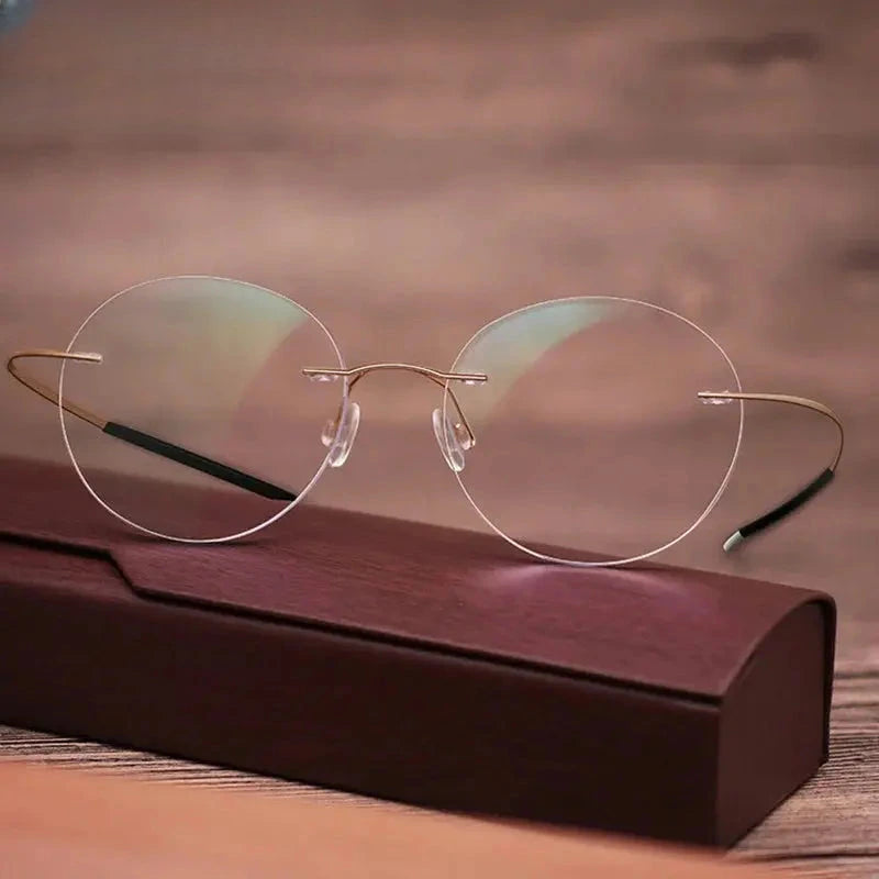 Unisex Oval Rimless Titanium Prescription Glasses 16016 — view 1 | Rx Spectacle