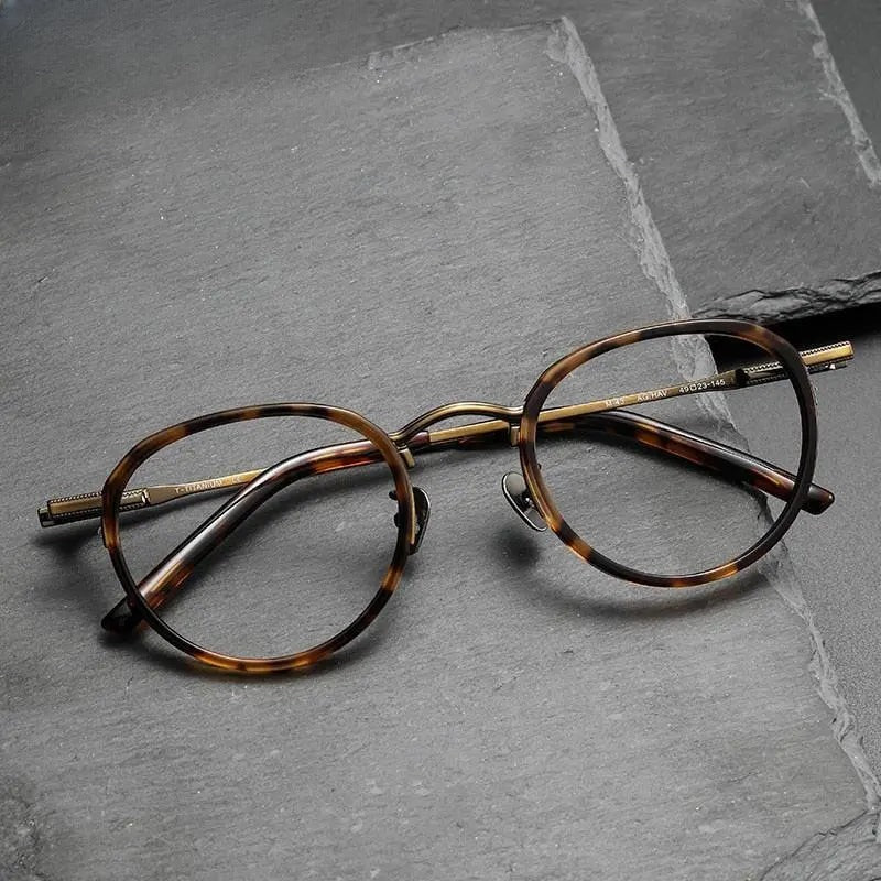 Unisex Round Full Rim Titanium Prescription Glasses M43 — view 1 | Rx Spectacle
