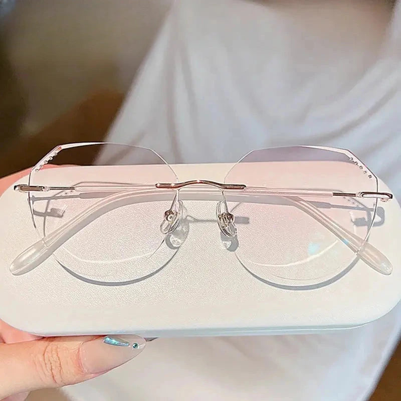 Women's Oval Rimless Titanium Flat Top Prescription Glasses 666085 — view 1 | Rx Spectacle