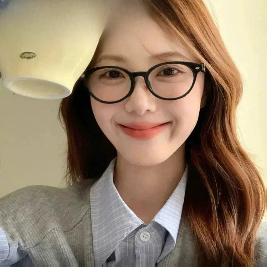 Women's Round Full Rim Titanium Prescription Glasses 33002 — view 1 | Rx Spectacle