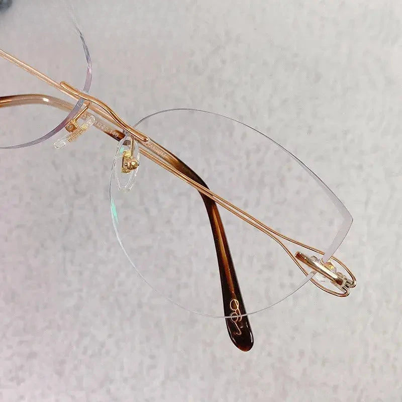 Women's Cat Eye Rimless Titanium Prescription Glasses 1337 — view 5 | Rx Spectacle
