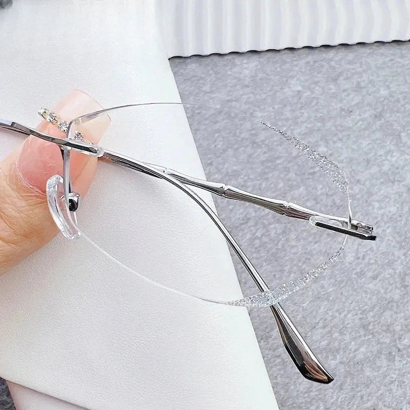 Women's Oval Rimless Titanium Prescription Glasses 691073 — view 2 | Rx Spectacle